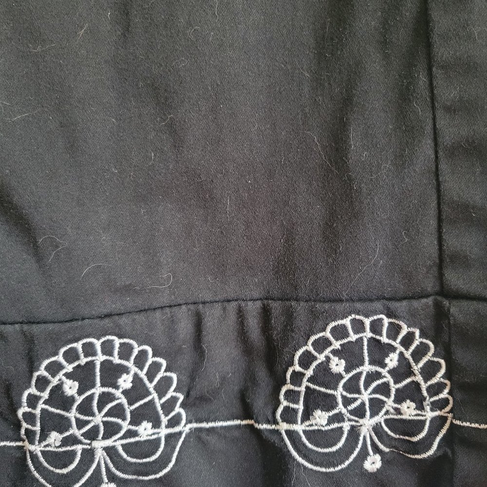 Ladies capris Black with white embroidery on bottom